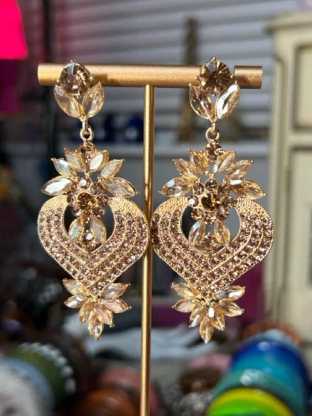 Vintage ornate Gold tone earrings with floral details